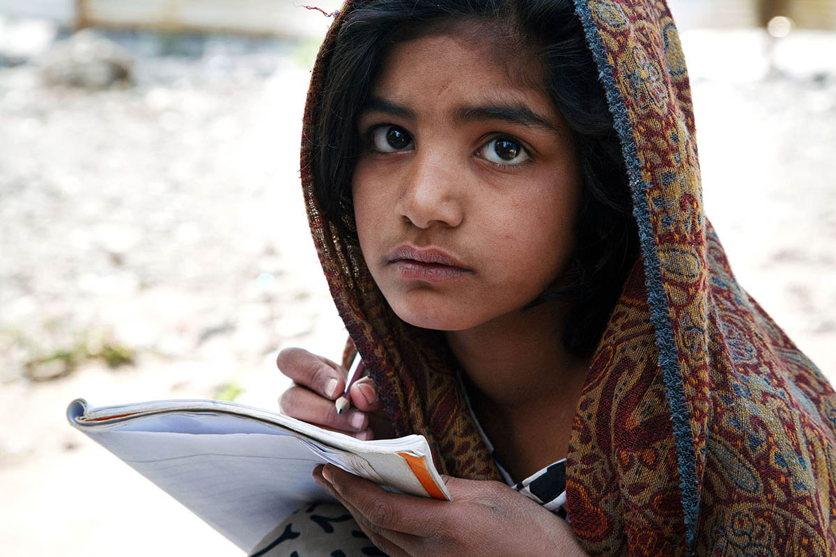A young girl at provisionary school in one of the camps for the 2005 earthquake survivors in Balakot, Pakistan.