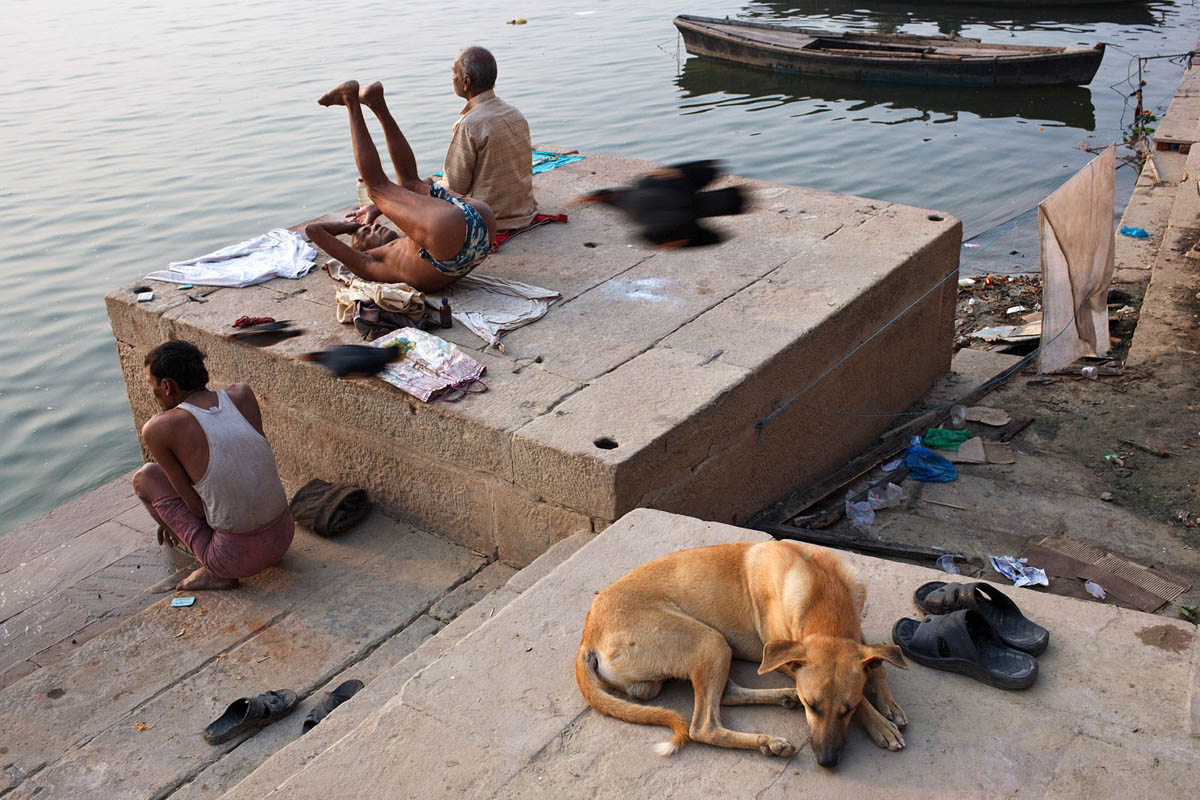 Morning exercising on the bank of Ganges river in Varanasi, India.
