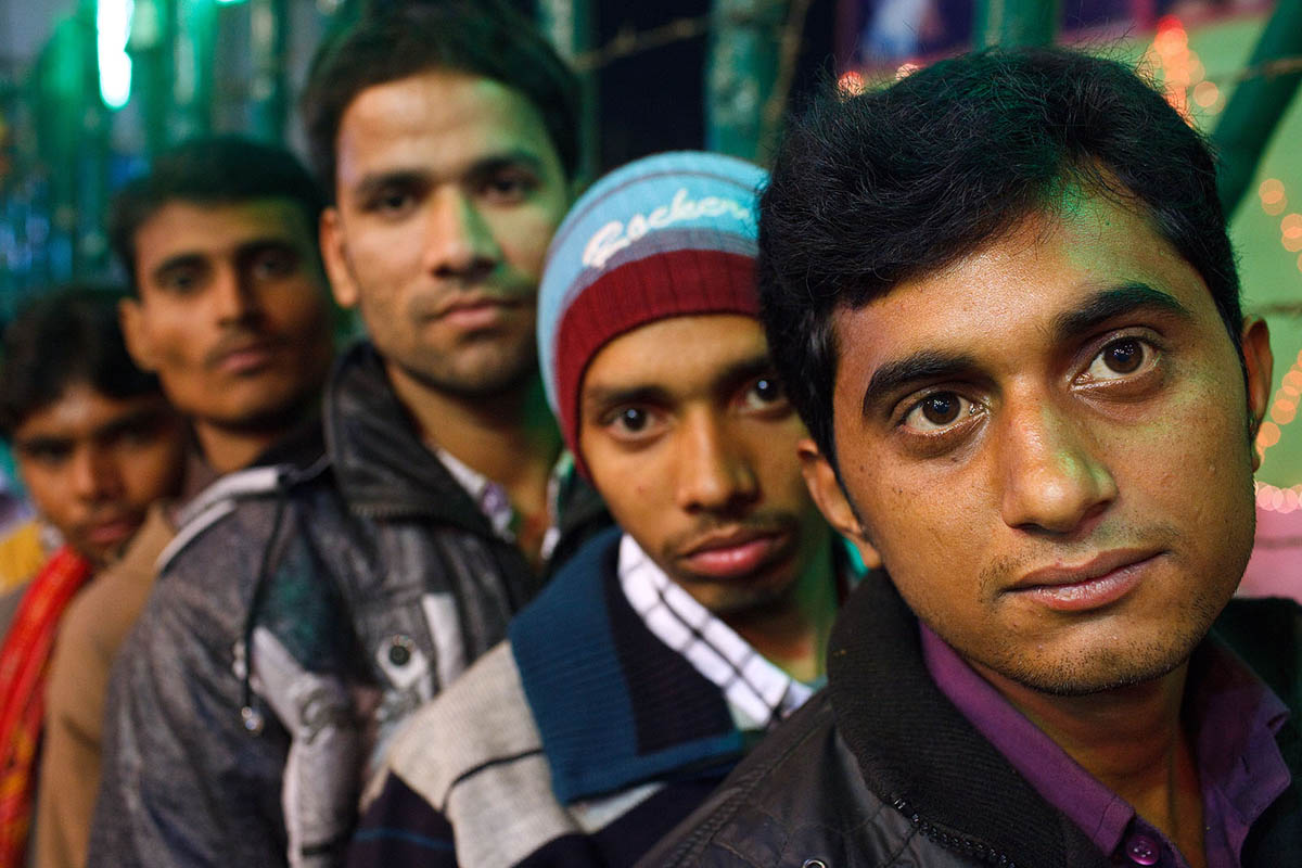 Indian men queue up for a dancing girls show at the Sonepur Mela 2012.