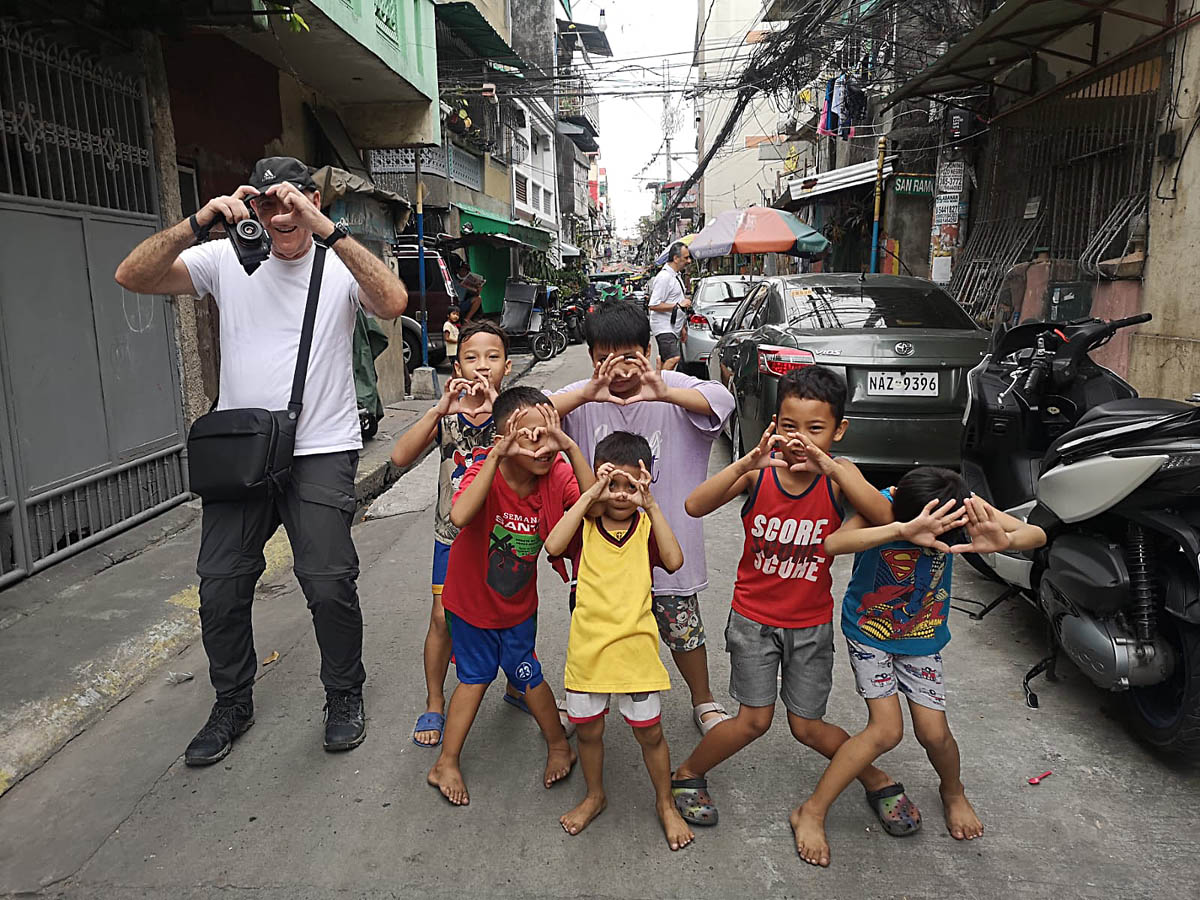 ivan_ferrer_street_photography_workshop_manila_philippines_tondo_love_scars